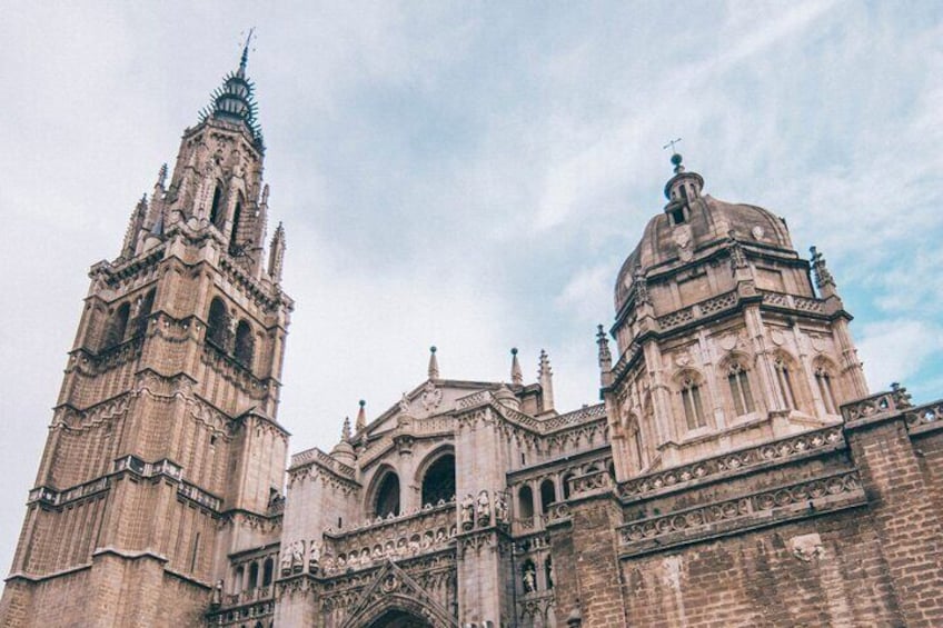 A historic cathedral with two prominent towers and intricate architectural details. 1