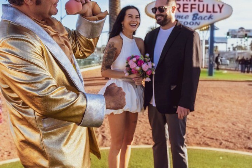Gold Elvis Wedding or Vow Renewal at Las Vegas Sign 5