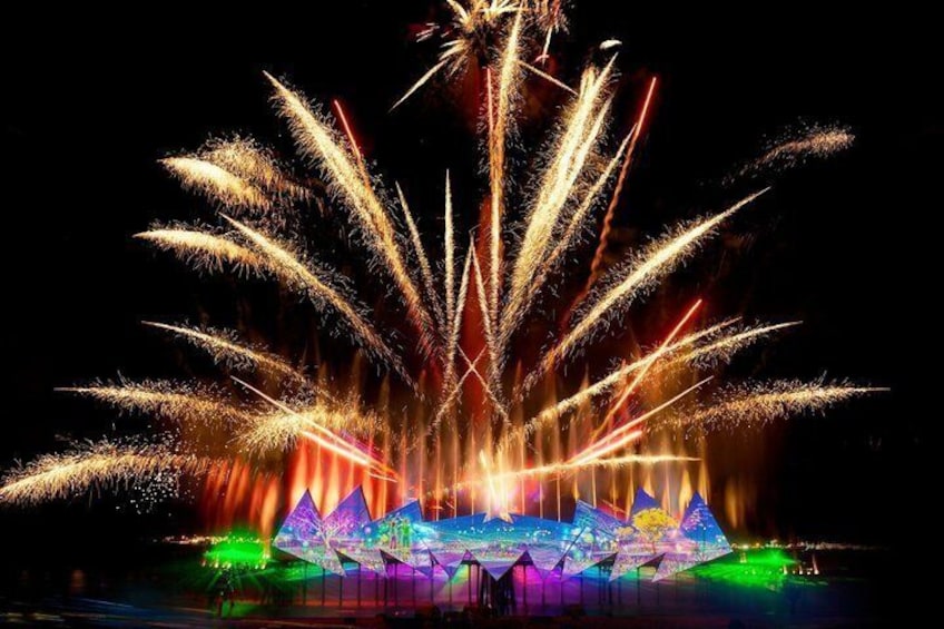 A nighttime fireworks display with colorful lights and fountains. 4