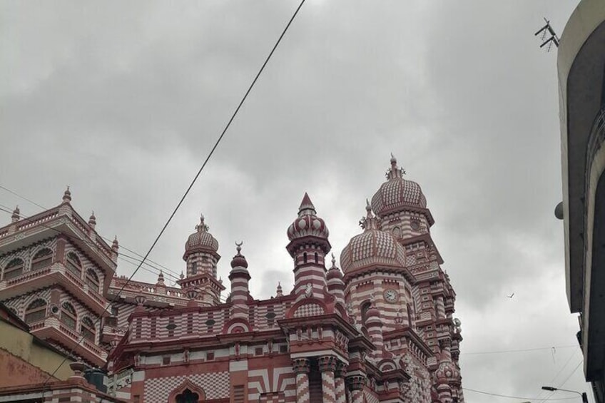 A large, ornate temple with multiple domes and intricate architectural details. 2