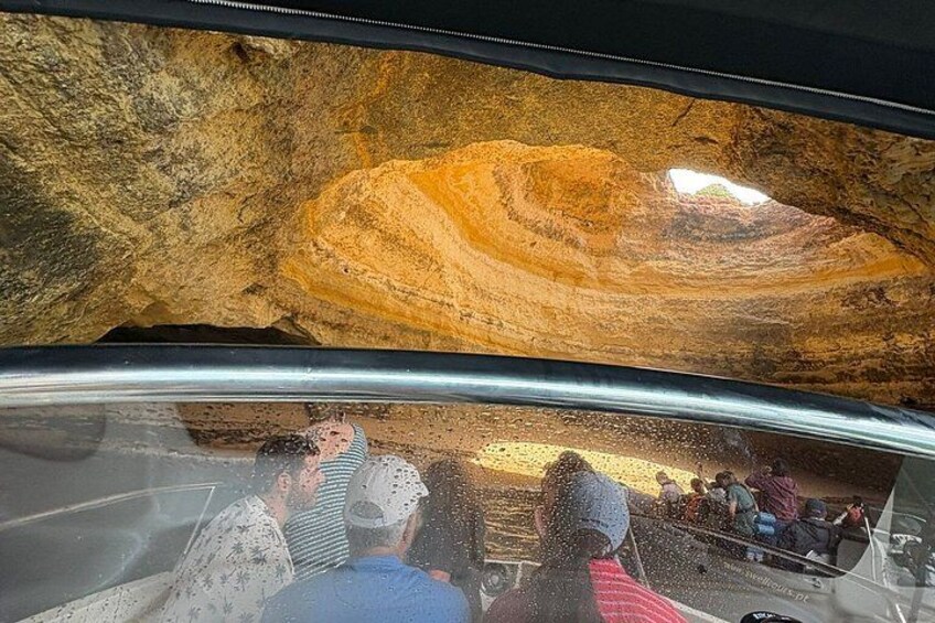 A cave interior with a large rock formation. 1