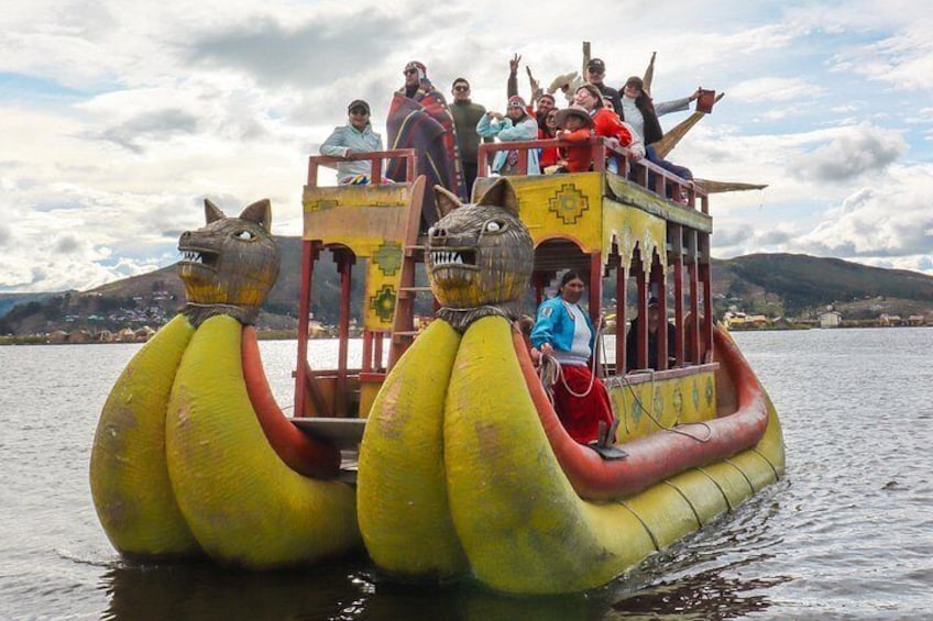 A boat with animal-shaped floats and passengers. 4