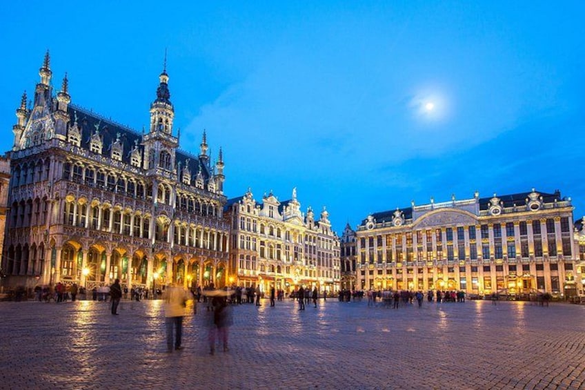 A historic European square with ornate buildings and a cobblestone ground. 3