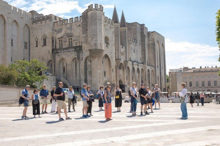 Admiring the Palace of the Popes in Avignon, France 2