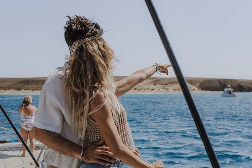 Couple admiring the coast 5