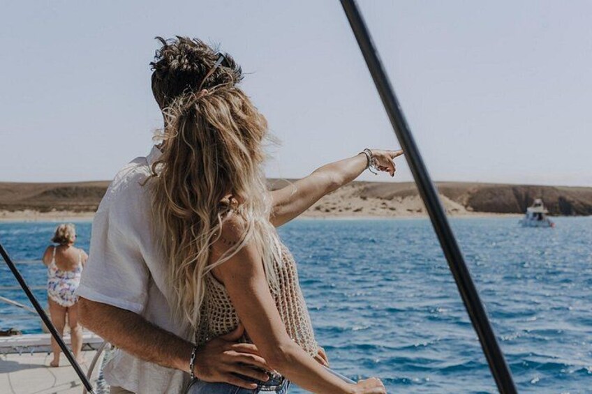 Couple admiring the coast 2