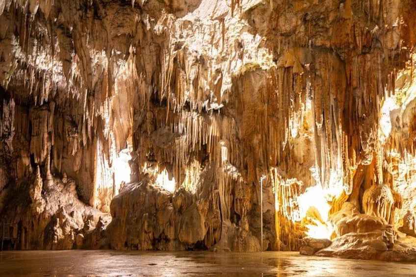A cave with stalactites and stalagmites. 3