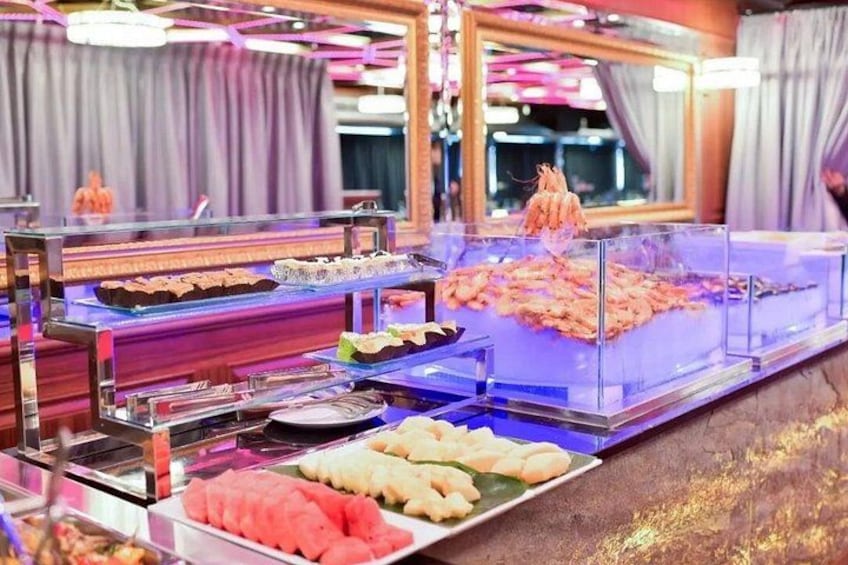 A buffet with various food items displayed in clear containers. 2