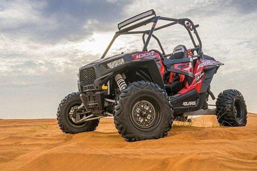 A Polaris 1000 ATV on a sandy terrain. 2