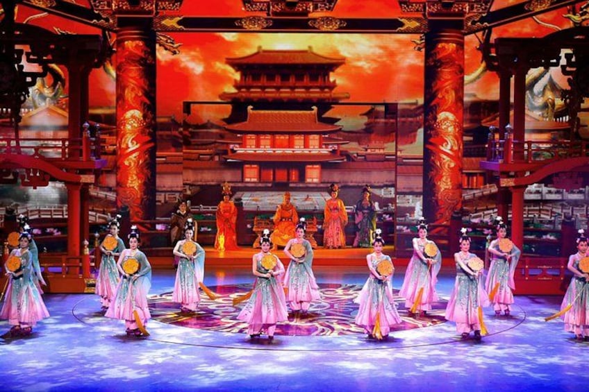 A traditional Chinese opera performance with performers in elaborate costumes. 3