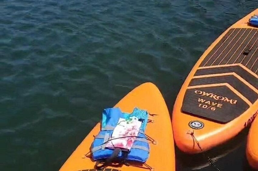 Two paddleboards on water. 2