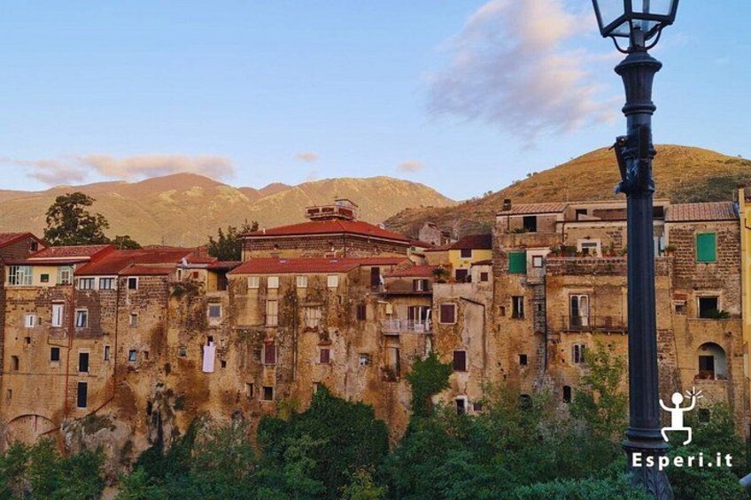 The village embraces the surrounding nature, suspended between mountains and sky. 2
