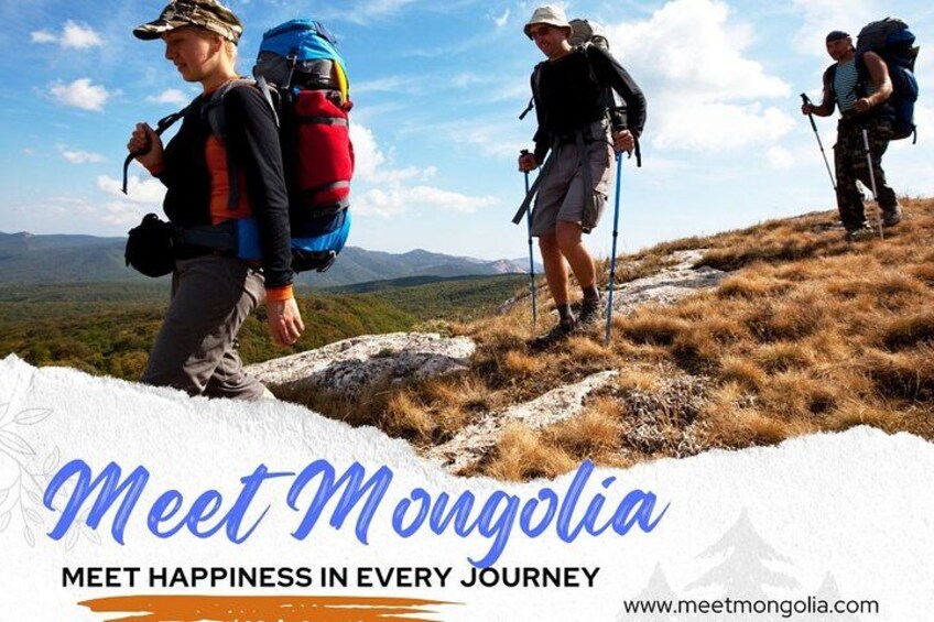 Hikers on a mountain trail with a clear sky. 2