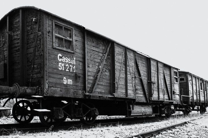 A black and white photograph of an old train car with the number 51271 and a height of 9 meters. 4