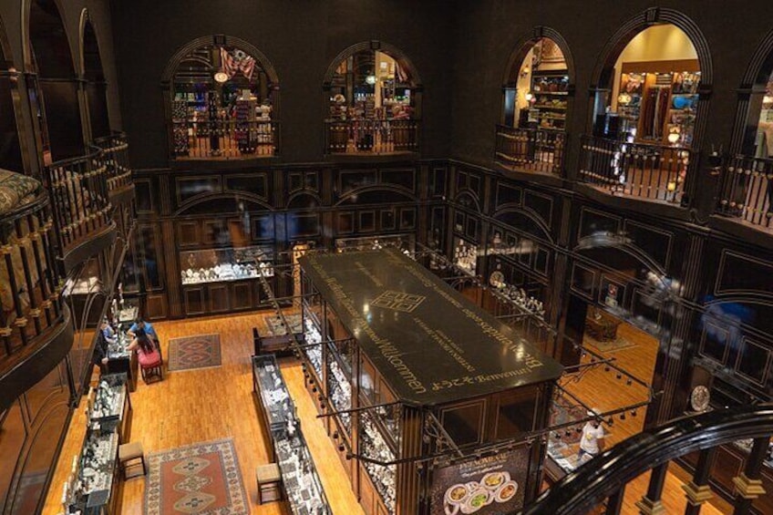 A multi-level bookstore with wooden floors and arched ceilings. 5