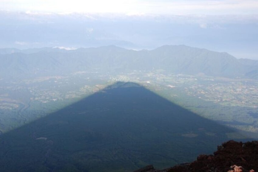 A mountain range with a valley below. 4