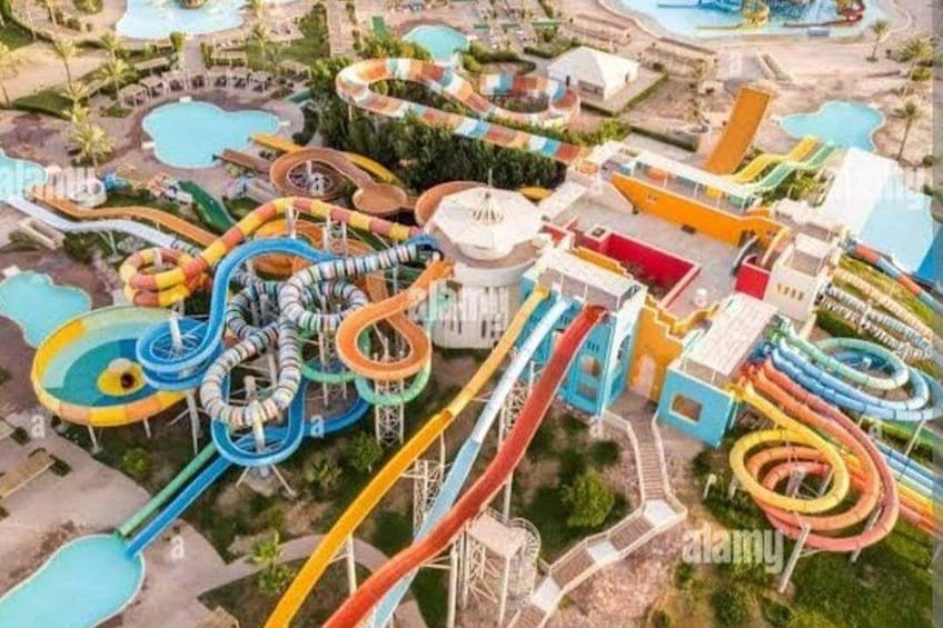 A water park with multiple slides and pools. 1
