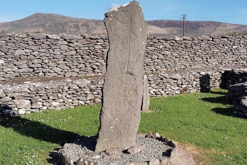 he ancient cross at Riasc – silent witness to centuries of devotion. 4