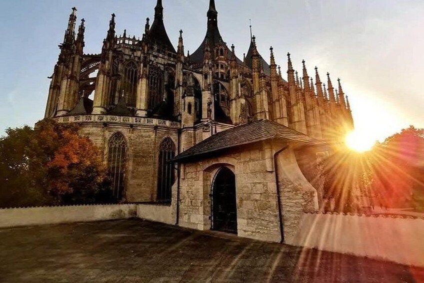 A Gothic cathedral with intricate spires and a large arched entrance. 2