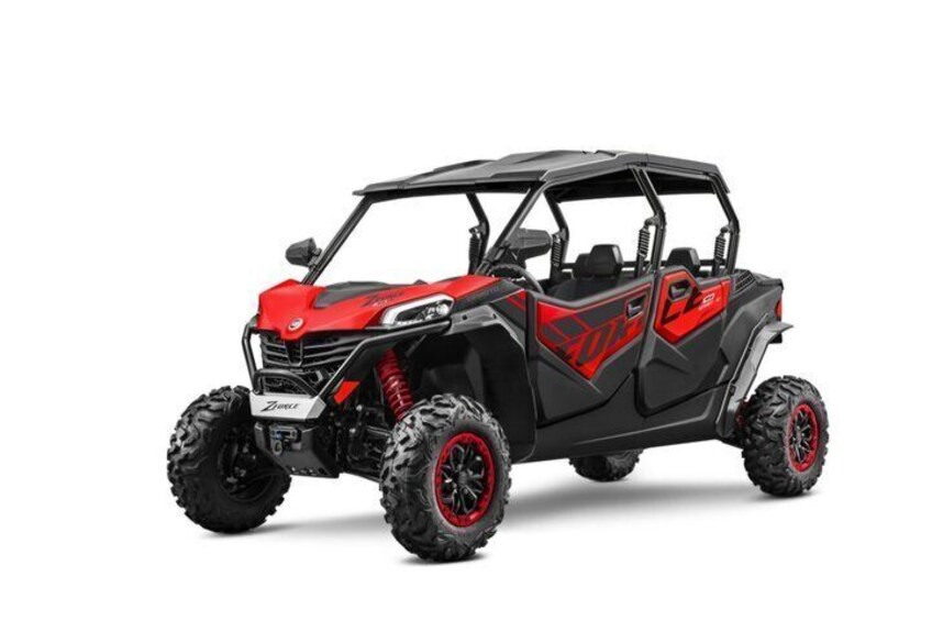 A red and black off-road vehicle with large tires and a rugged design. 1