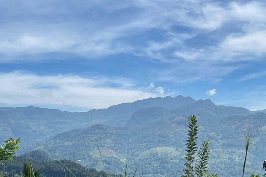 A mountainous landscape with clear skies. 1