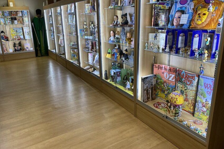 A bookstore with shelves of books and toys. 5