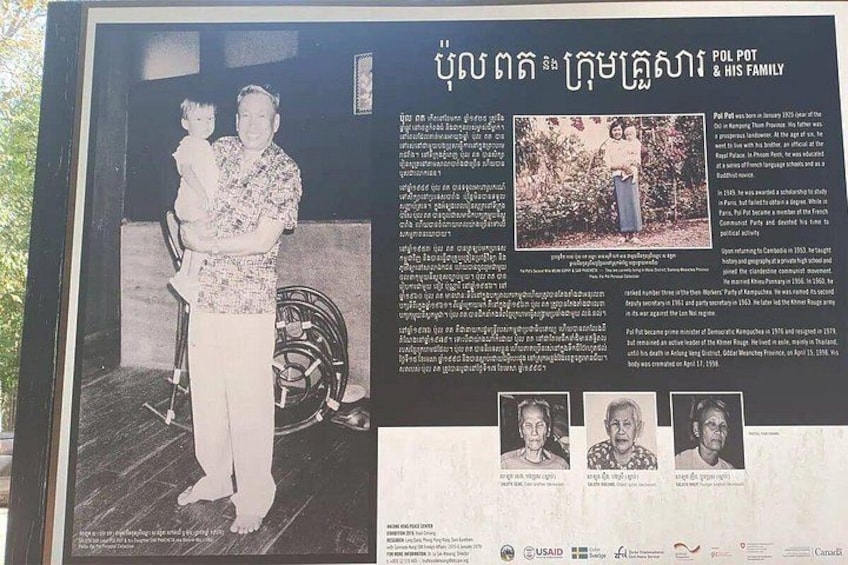 A historical exhibit with a family photo, text, and a small portrait. 4