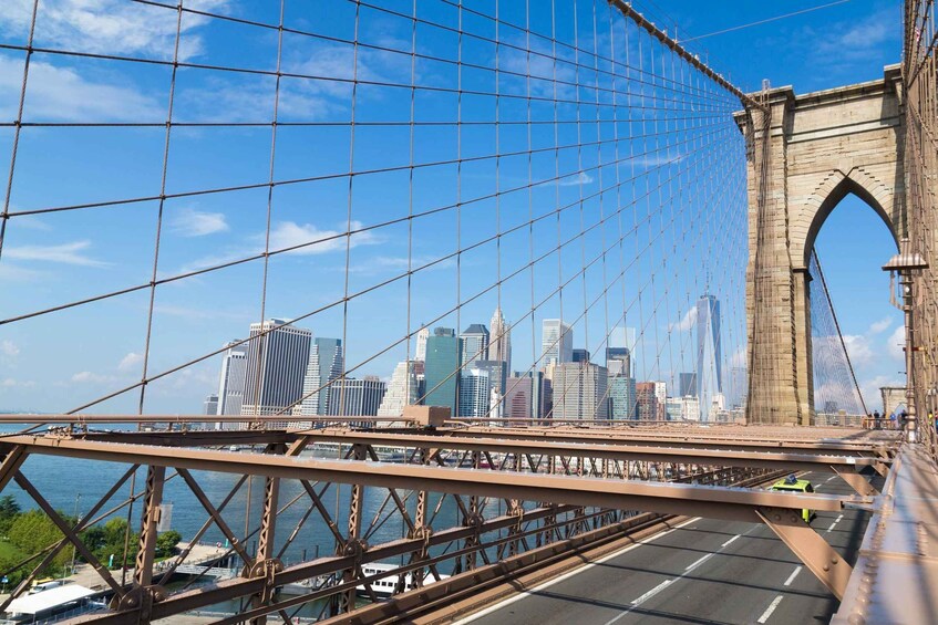 A bridge with a city skyline in the background. 1