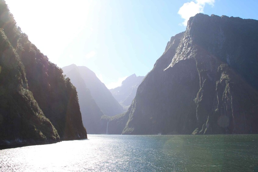 A mountainous landscape with a calm lake. 2