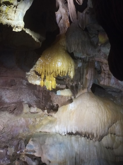 A cave with stalactites and stalagmites. 4