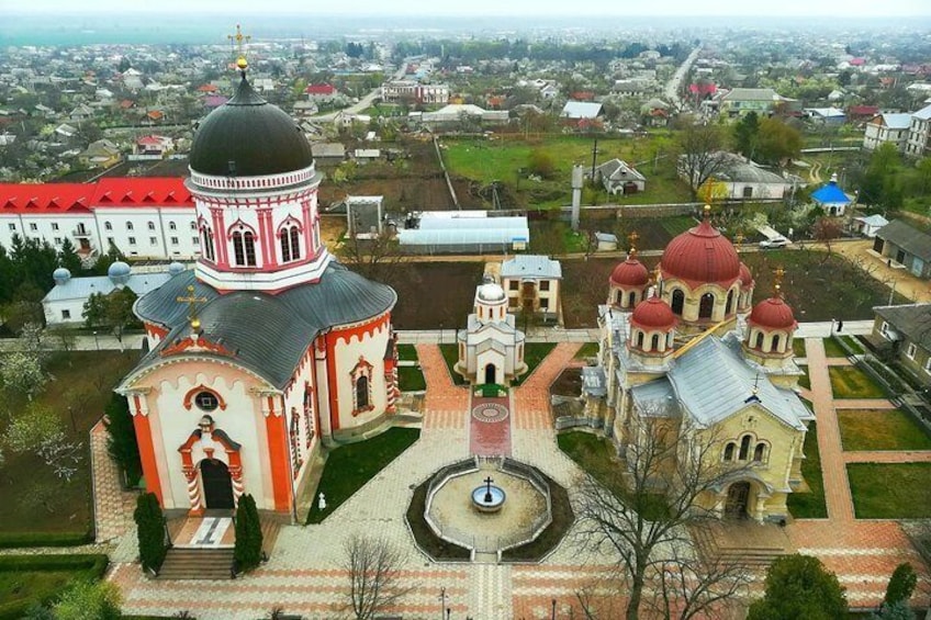 A church complex with multiple domes and a central courtyard. 5
