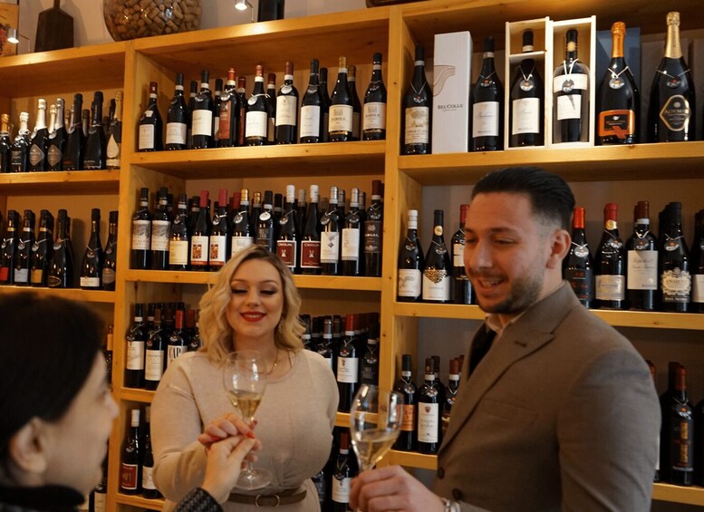 A wine cellar with shelves stocked with various wine bottles. 3