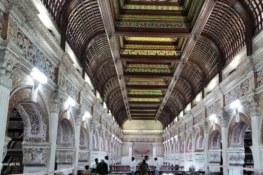 An ornate interior with intricate arches and a high ceiling. 5