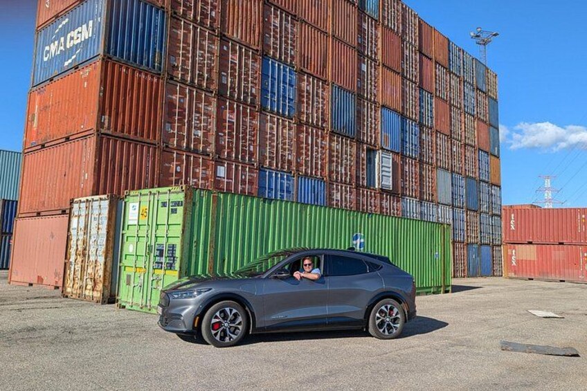 Gain perspective on the magnitude of this port as we drive past mountains of containers. 5
