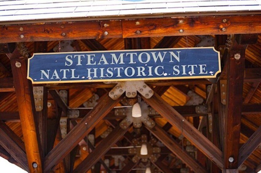A wooden structure with a sign that reads 'STEAMTOWN NATL. HISTORIC. SITE.' 3
