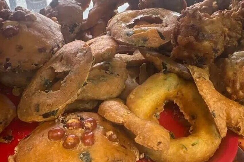 A variety of fried foods, including fried fish and vegetables. 3