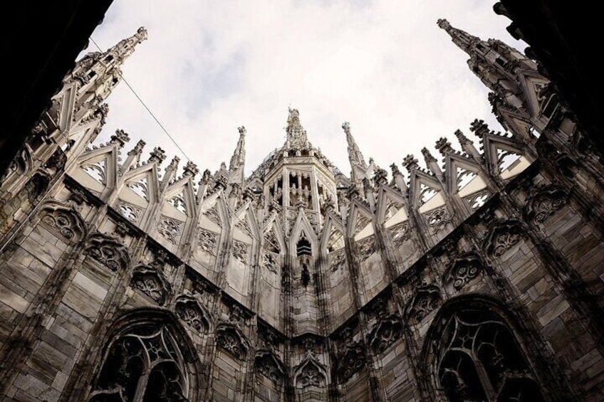 A Gothic cathedral with intricate stone carvings and pointed arches. 2