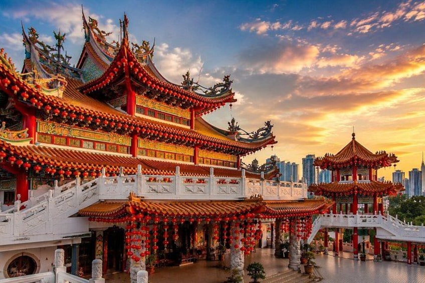 A traditional Chinese temple with ornate architecture, a white bridge, and a pagoda. 3