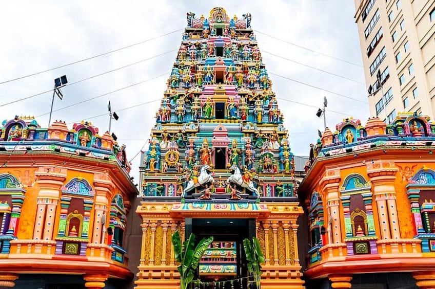A colorful temple with intricate carvings and statues. 2