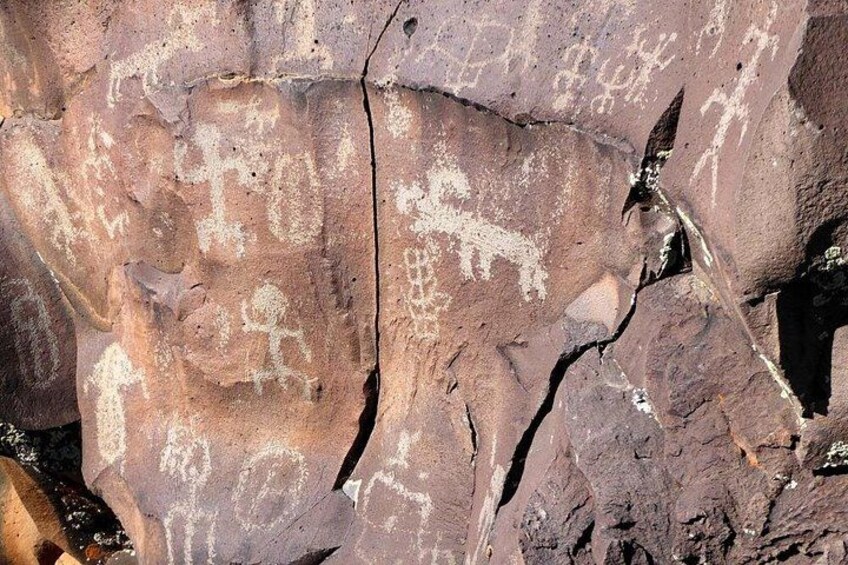 A rock with ancient petroglyphs. 4