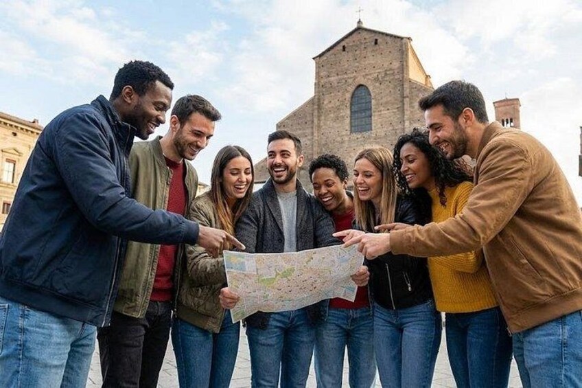 A group of people examining a map outdoors with a historic building in the background. 1
