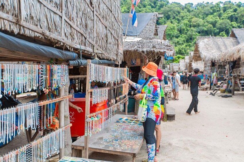 A market with handmade jewelry and textiles. 4