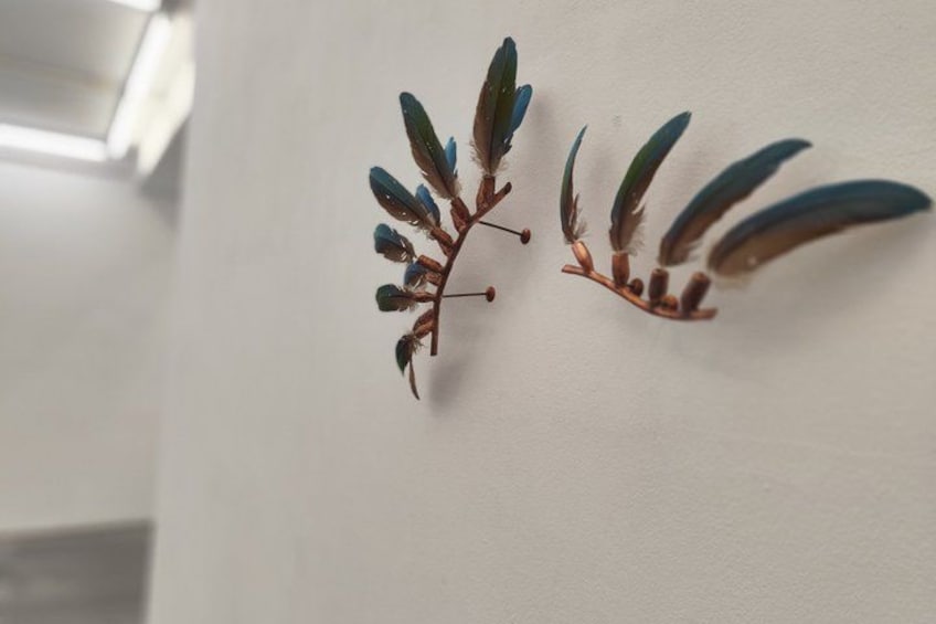 Two wall-mounted decorative branches with leaves and berries. 2
