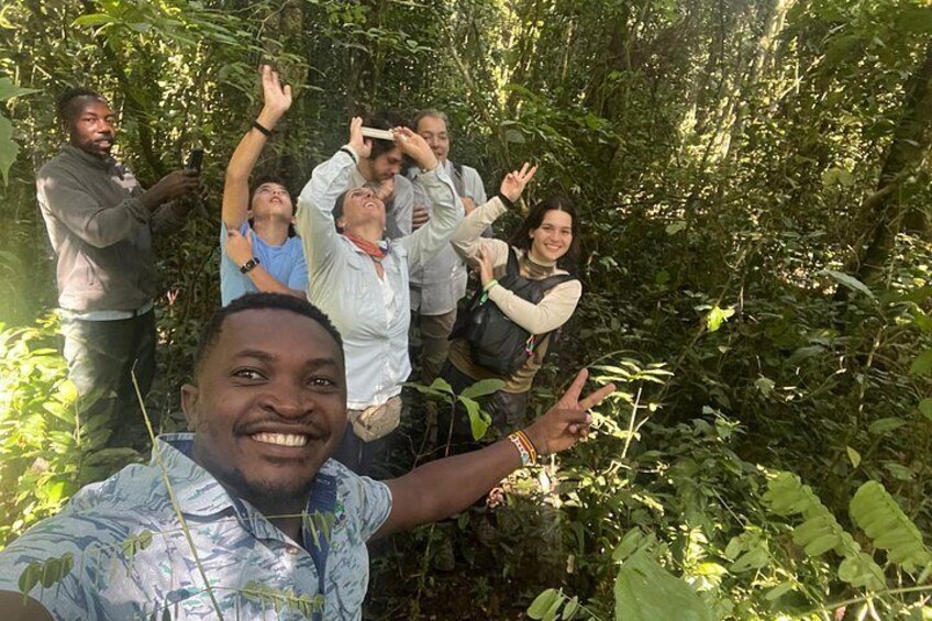 A group of people in a forested area. 3