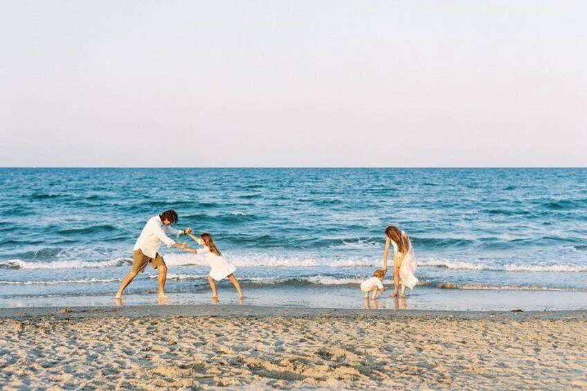A beach scene with people playing in the water. 3