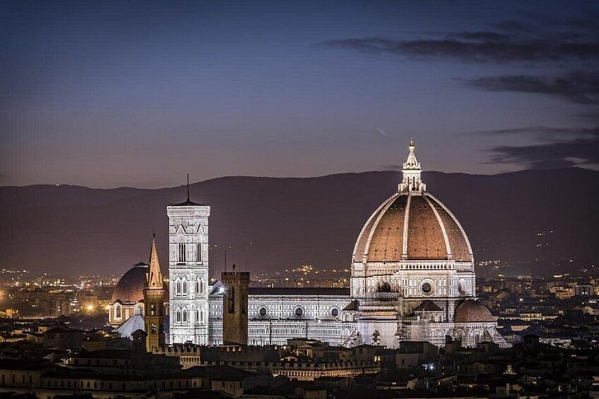 A large cathedral with a prominent dome and a bell tower. 4