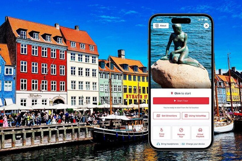 Un smartphone affichant une carte sur laquelle on peut voir une statue, un pont et des bâtiments aux couleurs vives. 1