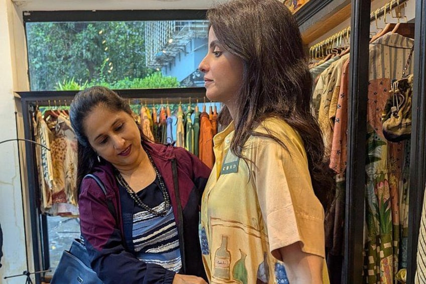 Helping my international guest find unique Indowestern collection. 4