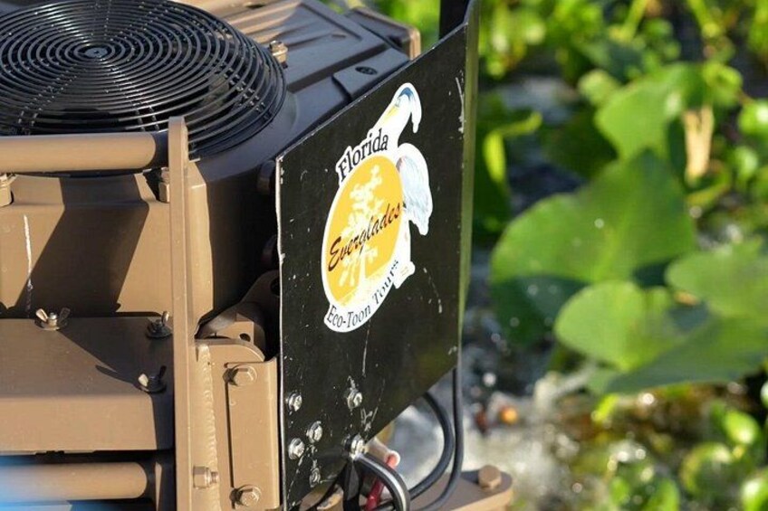 A water pump with a Florida sticker and a logo. 4