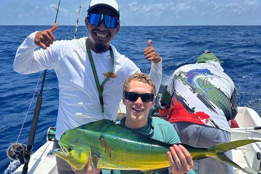 Captain Mauricio + a happy guest = another successful day on the Caribbean. 1